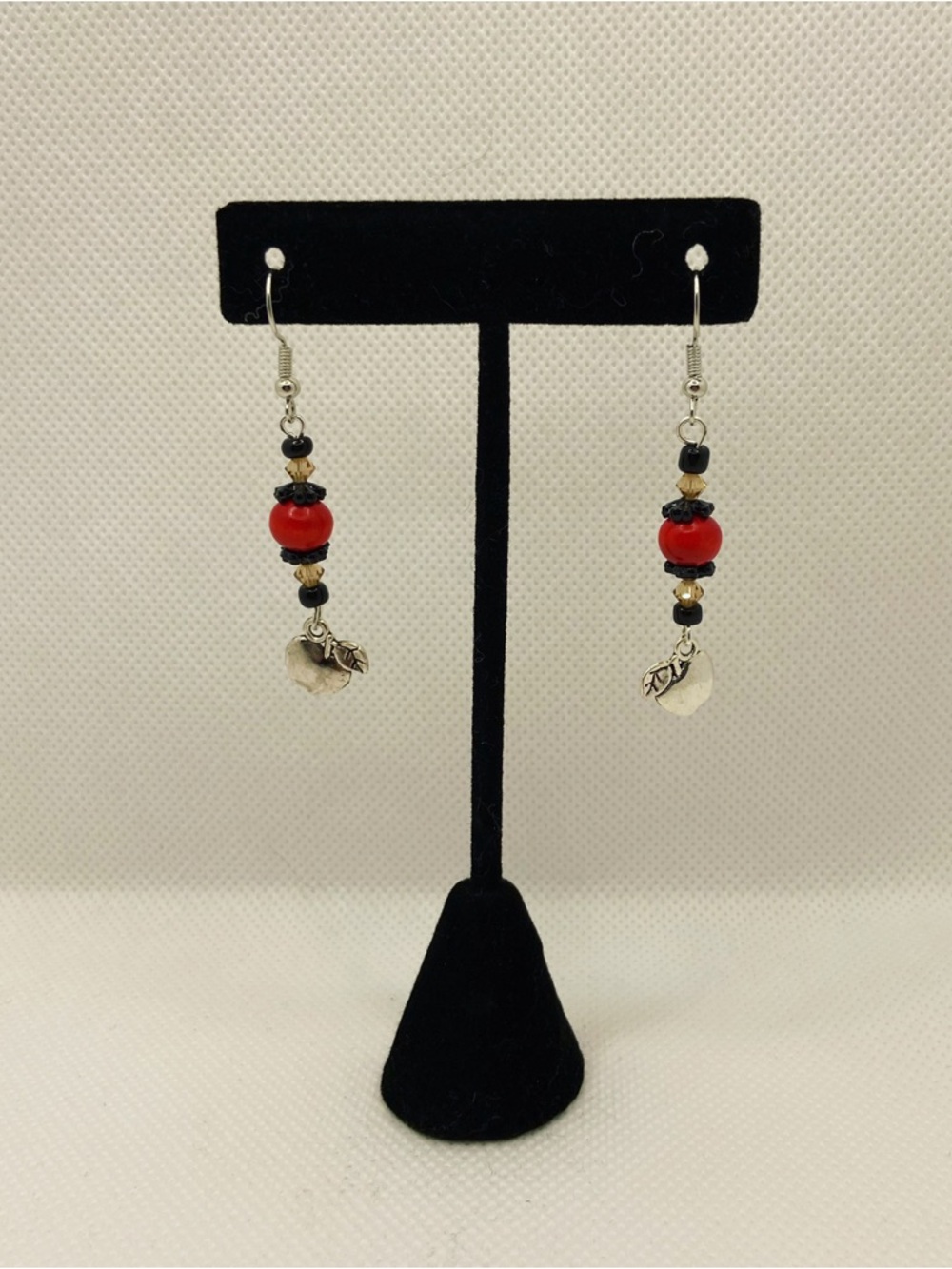 Handmade Red Bead Dangle Earrings with Silver Leaf Charm
